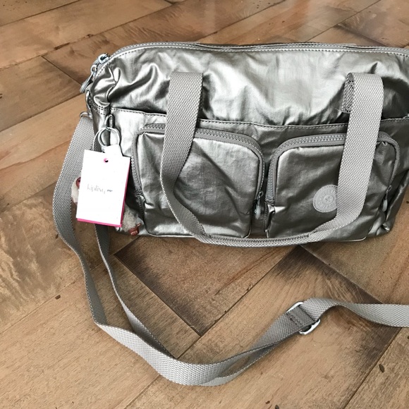 kipling front pocket satchel